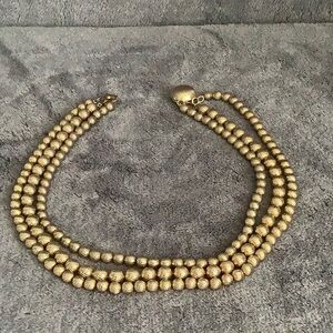 Vintage gold three-strand sarah coventry necklace